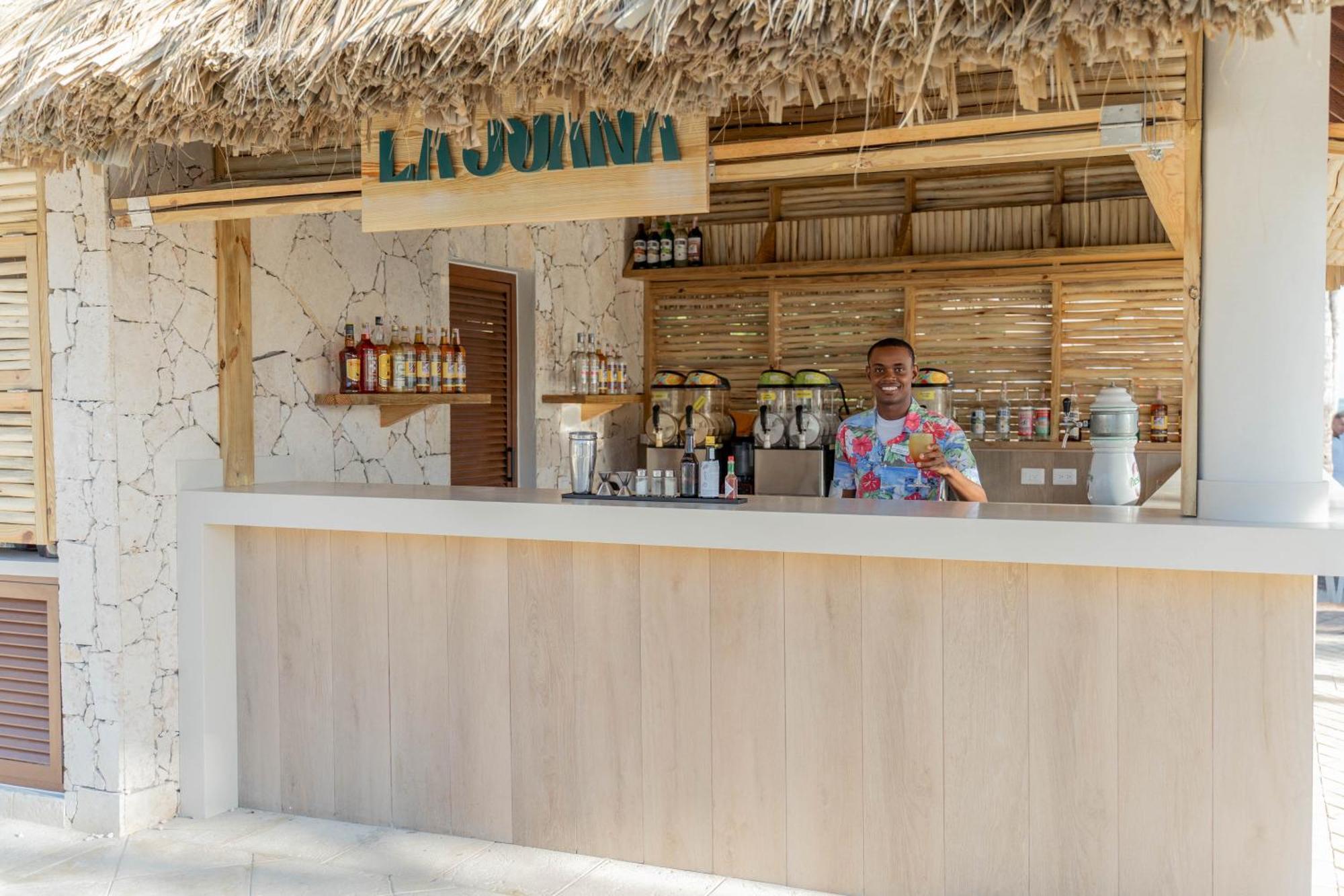 Bahia Principe Grand Bavaro Punta Cana Exterior photo A bartender at work