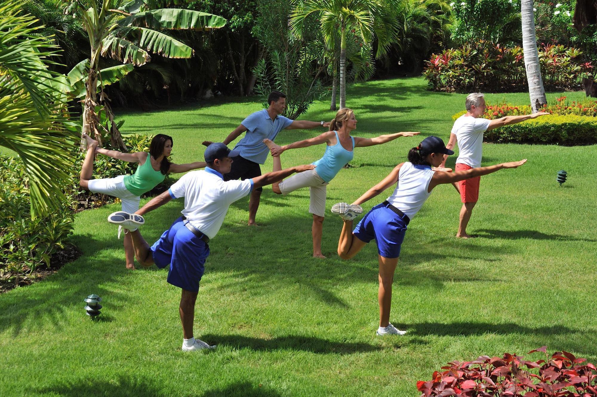 Bahia Principe Grand Bavaro Punta Cana Exterior photo A group of people doing yoga